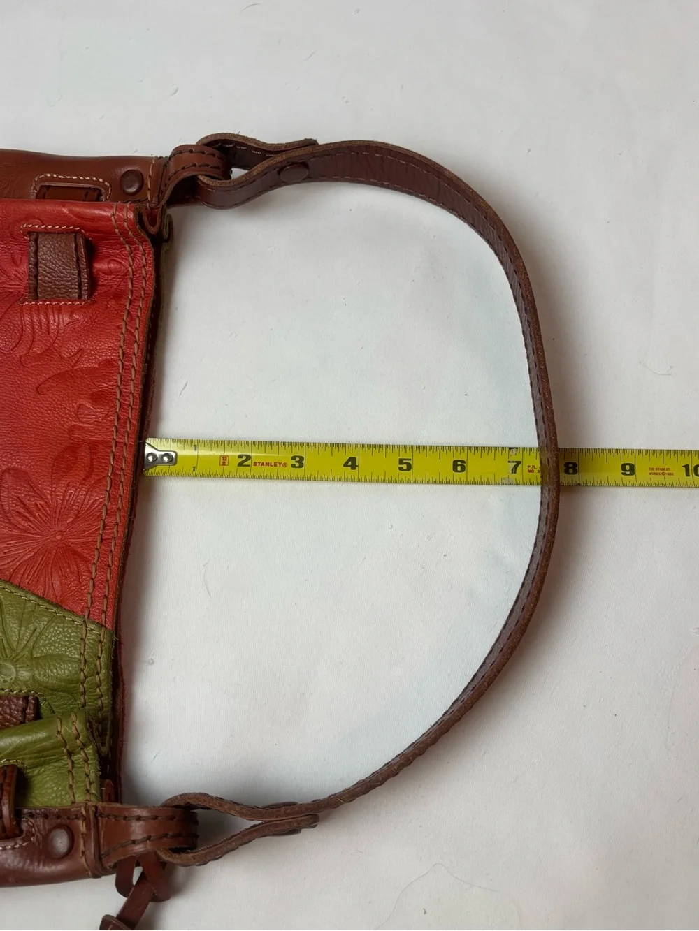 Fossil tooled leather